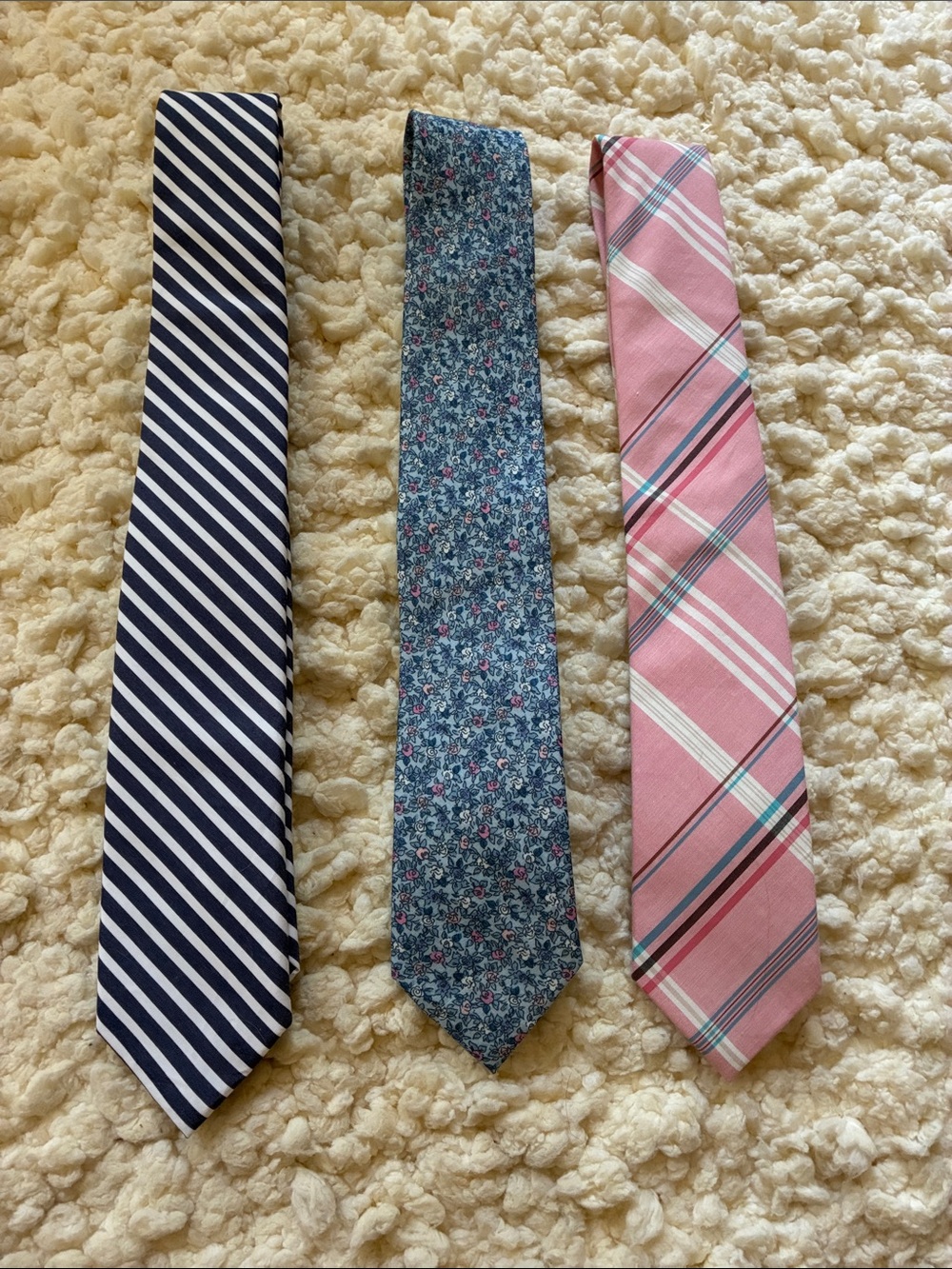 The Tie Bar Navy Stripe, Blue Floral, and Pink Plaid Neckties